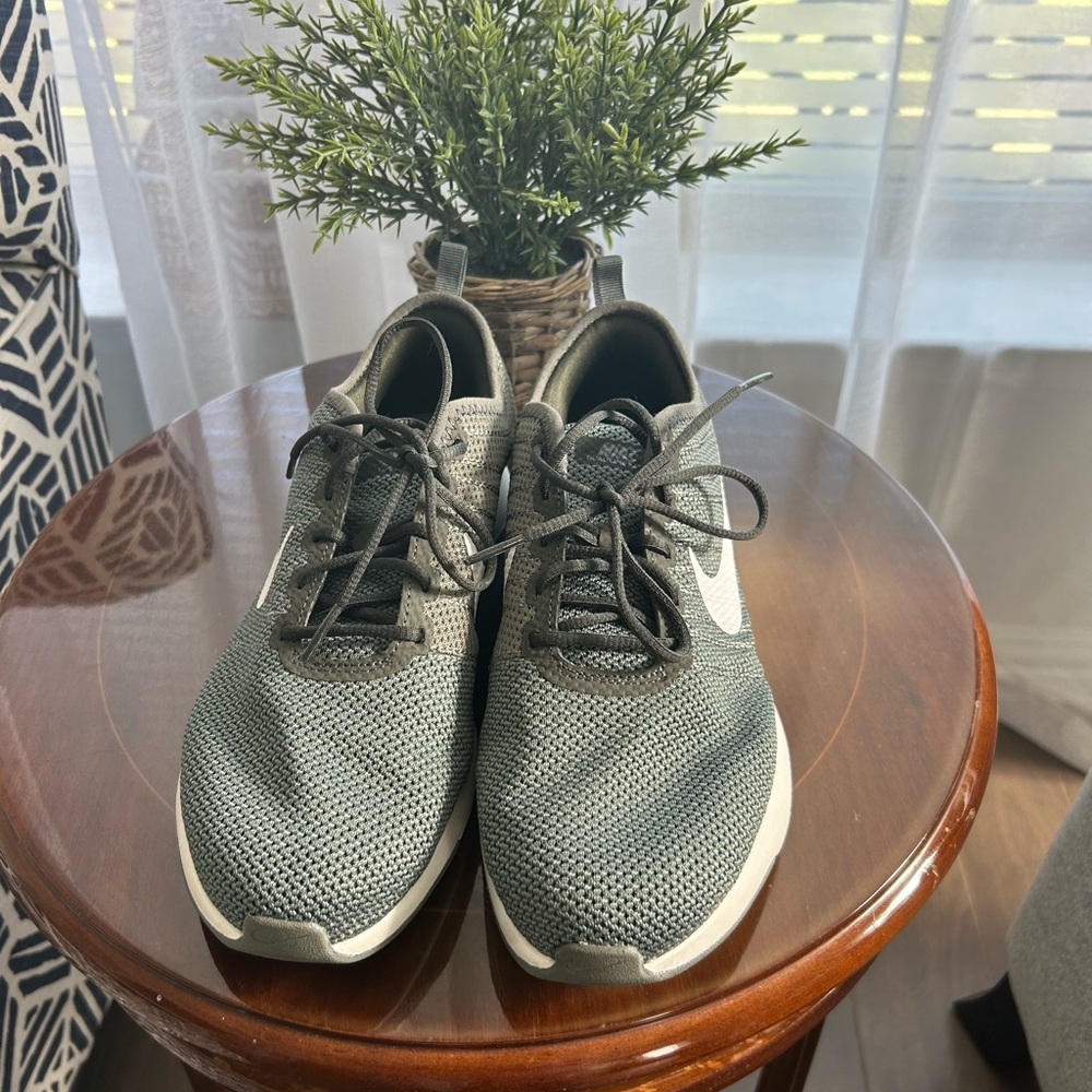Nike shoes 7Y olive green will fit a size 8 women
